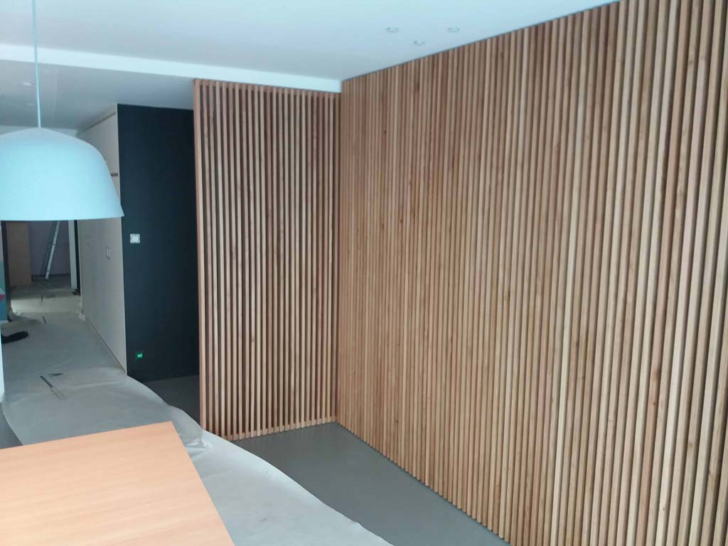 réalisaion de l'aménagement d'une cloison en bois par bg menuiserie